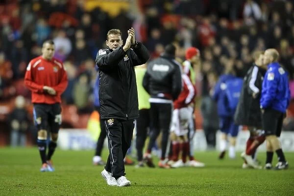 Graham Westley of Stevenage Congratulates Fans After 4-1 Loss to Bristol City