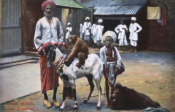 Banda Wallah (showman) with boy and animals, India