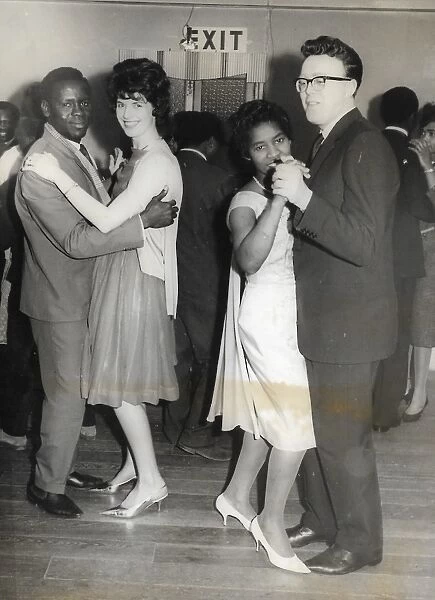 Black and white couples mixed on the dance floor in Nottingh