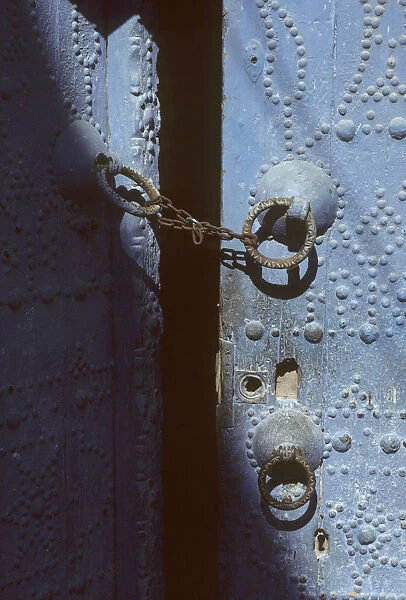 Blue door with chain, Nefta, Tunisia