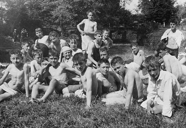 Boys Club, swimming and relaxing by river, 1928