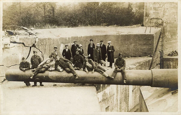 Captured gun, Long Max, Belgium, with civilians posing