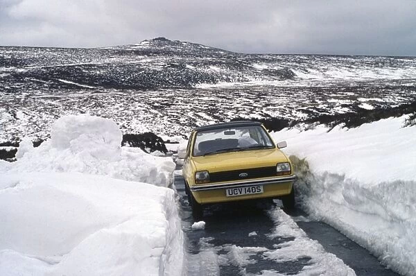 Car in the snow on Dartmoor, Devon