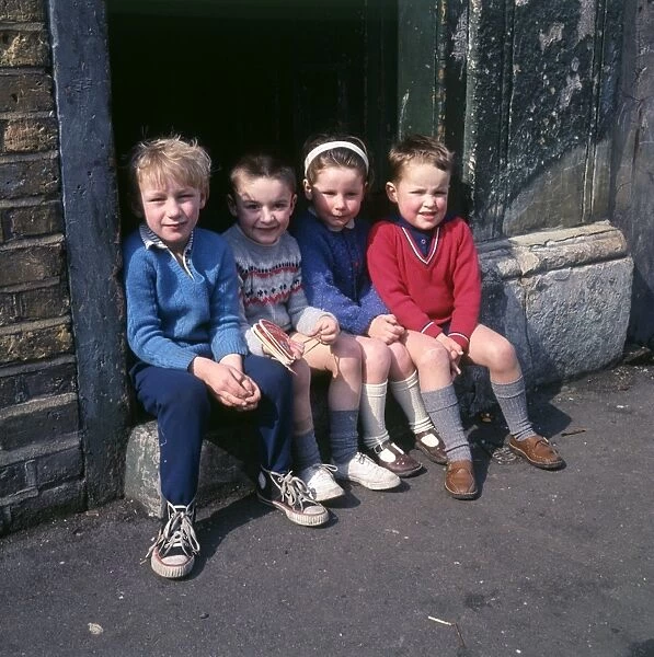 Children on doorstep in a Balham street, SW London
