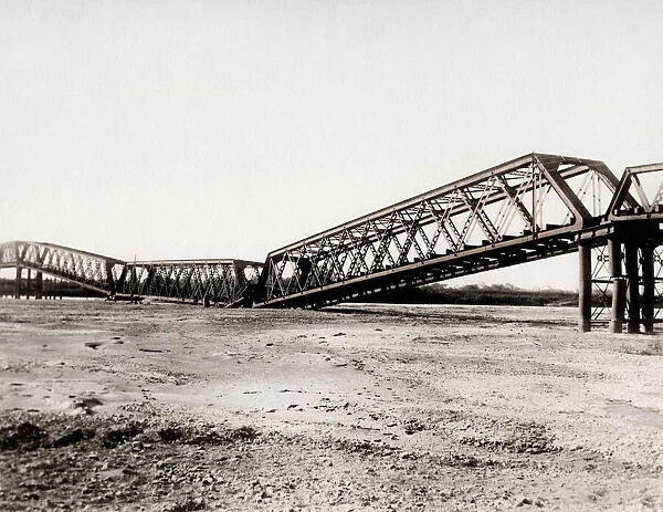Earthquake damage in Japan c. 1890, collapsed bridge
