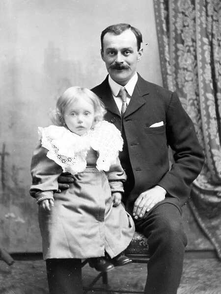 Father and daughter in studio photo, Mid Wales