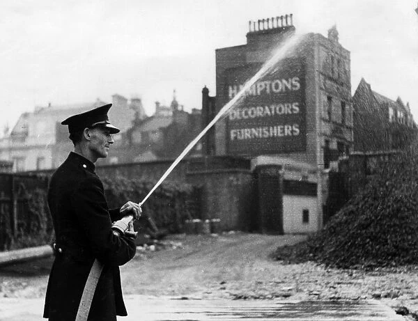 Firefighter in Orange Street, London W1, WW2