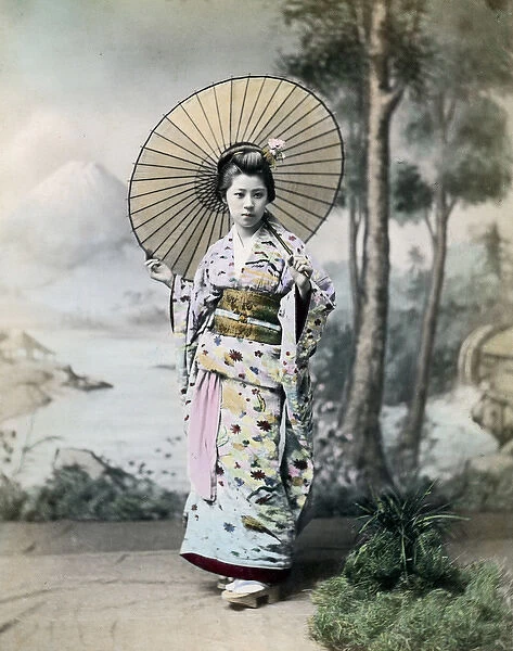 Geisha with parasol, Japan, circa 1880s
