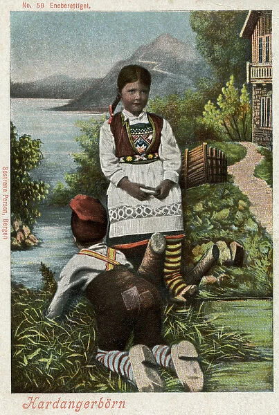 Hardanger, Norway - boy and girl in traditional costume