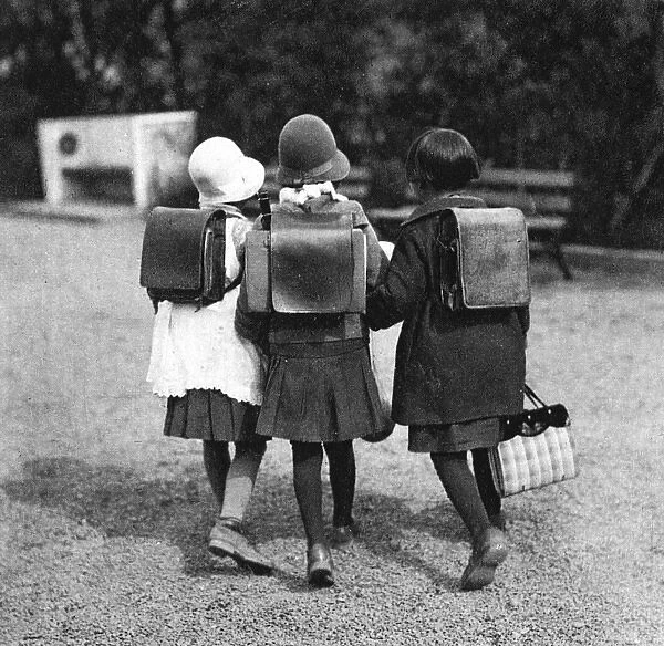 Japan Three young schoogirls with matching satchels
