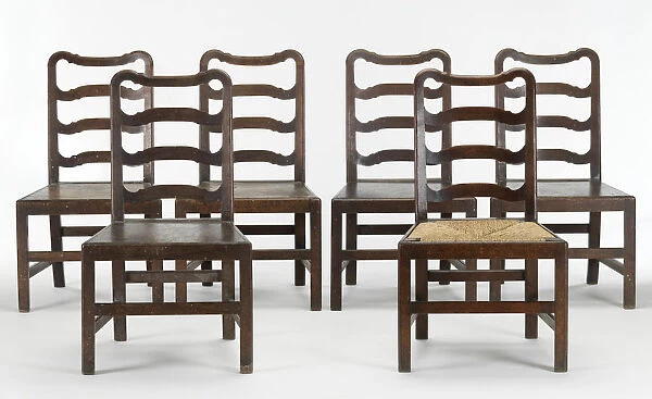 Six ladder-back chairs