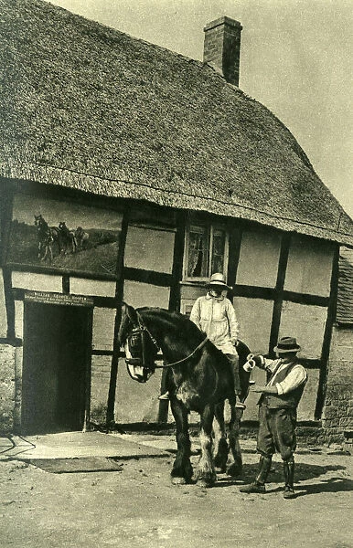 Men outside the Plough and Harrow Inn, Worcestershire