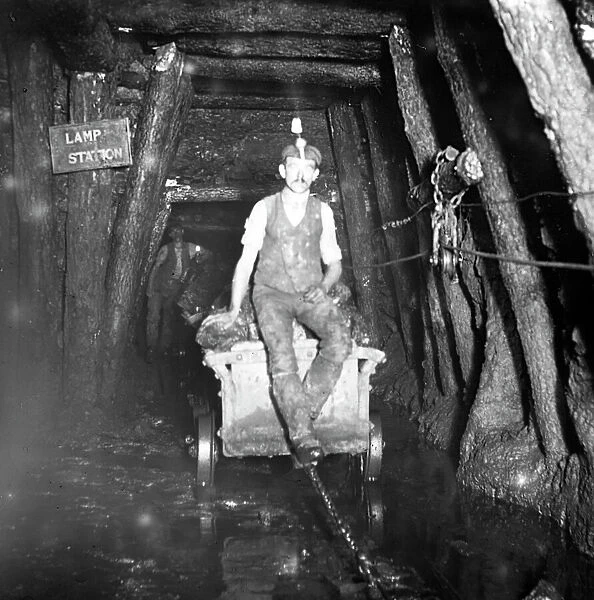 Miner riding drams, Tirpentwys Colliery, South Wales