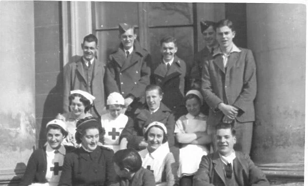 Nurses and probable airmen outside Montgomery House