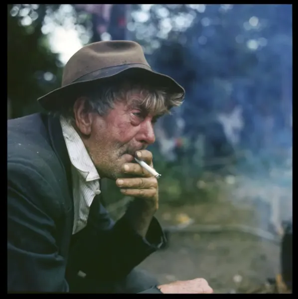 does gypsy smoke cigarettes Framed Print of Old Gypsy Man Smoking Print: Surrey Encampment Scene.  Framed Print from Mary Evans