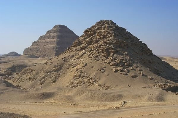 Pyramid of Userkaf. At background, Djoser Pyramid. Egypt