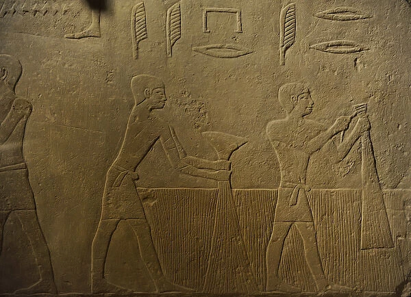 Relief depicting a men harvesting in presence of Hetepet. De