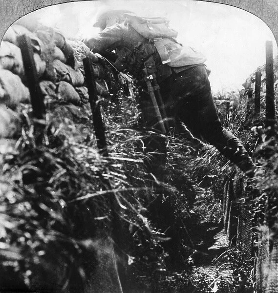 Soldier emerging from trench, WW1