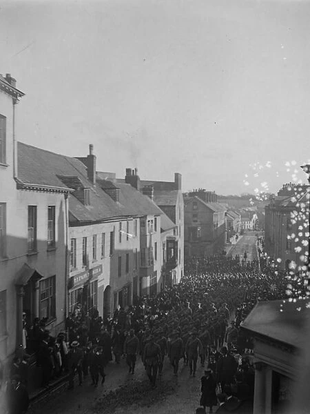 Soldiers march up High Street, Haverfordwest, South Wales