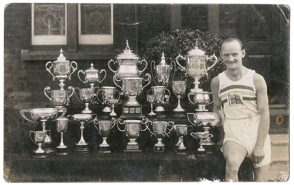 Tommy Green with 24 trophies, 1932 Olympics