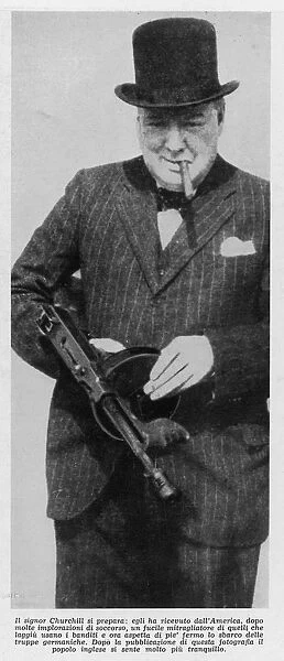 Winston Churchill (1874-1965) holding tommy gun while visiting America