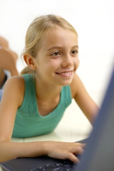 Girl using a laptop computer