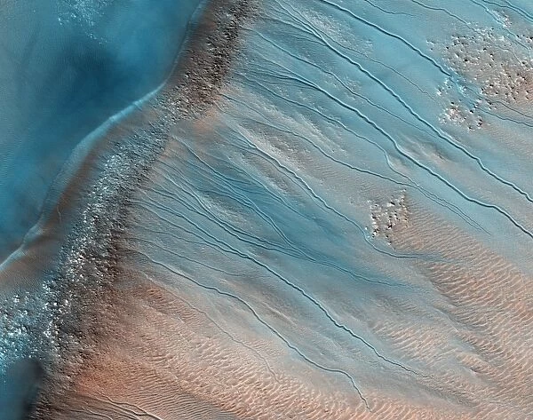 Gullies on Mars. Coloured satellite image of gullies on the wall of a crater