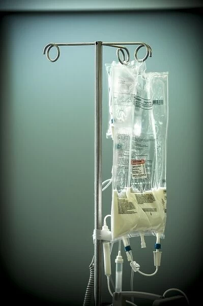 IV bag. Close-up of an IV (intravenous) available as Framed Prints, Photos,  Wall Art and Photo Gifts