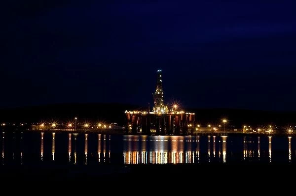 Oil drilling rig at night, North Sea