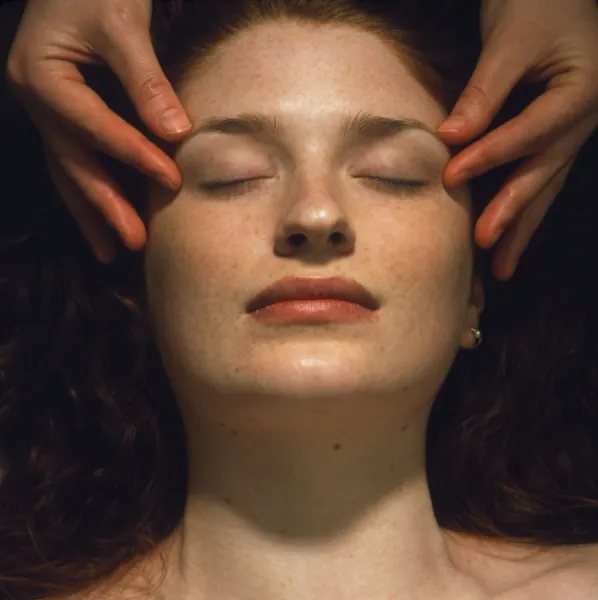 Woman receives a facial massage