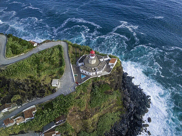 Aerial view of Farol do Arnel lighthouse and Arnel point, Sao Miguel island, Azores, Portugal, Atlantic, Europe
