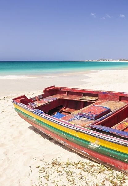 Colourful traditional local fishing boat on the beach at Santa Maria, Praia da Santa Maria