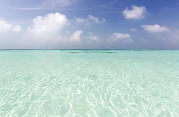 Crystal clear sea and blue sky, Coco Palm resort, Dhuni Kolhu, Baa Atoll, Republic of Maldives
