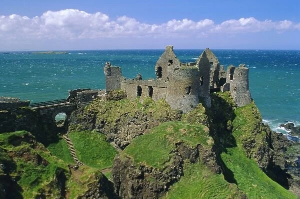 Dunluce Castle on rocky coastline