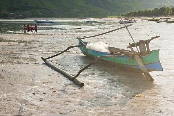 Fishing boat lying on Kuta Beach, Kuta Lombok, Indonesia, Southeast Asia, Asia