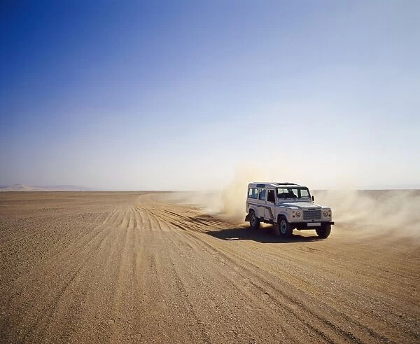 Four-wheel drive Landrover, off-roading in the desert, Algeria, Africa