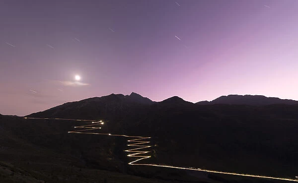 Lights of car traces at dusk, Spluga Pass, Chiavenna Valley, Switzerland, Europe