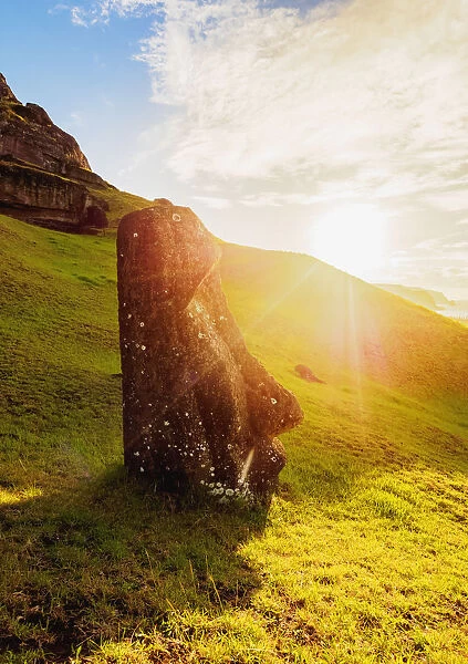 Moai at the quarry on the slope of the Rano Raraku Volcano at sunrise, Rapa Nui National Park