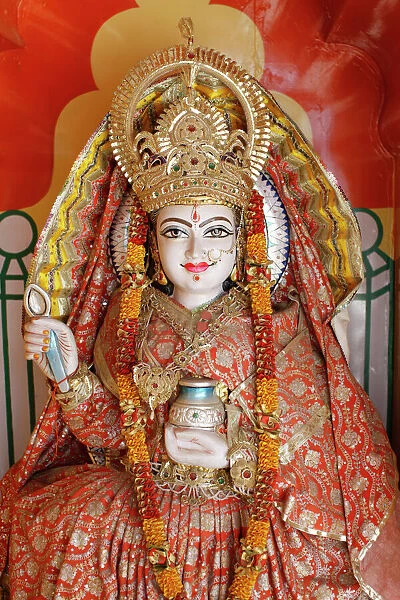 Statue of the Hindu goddess Annapurna (Parvati) giving food #6226496