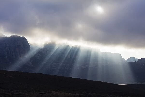 Sunrays breaking through cloud, Andringitra National Park, Ambalavao, central area
