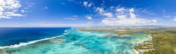 Turquoise coral reef meeting the waves of the Indian Ocean, aerial view, Poste Lafayette