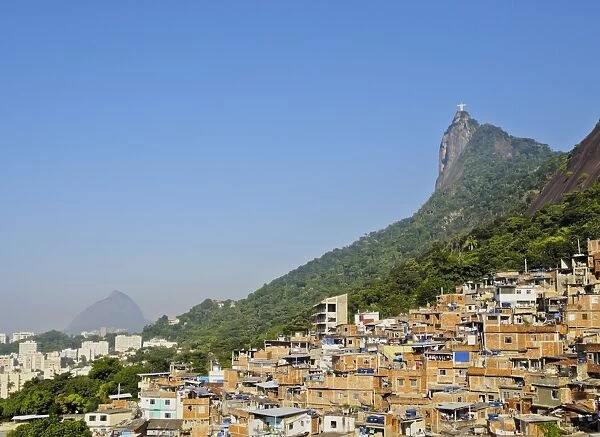 View of the Favela Santa Marta with Corcovado and the Christ statue behind, Rio de Janeiro