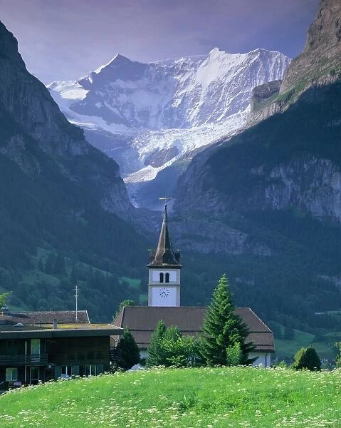 Village church and Oberer Grindelwald Glacier