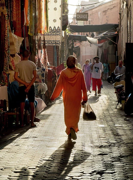 Woman in pink, Medina souk, Marrakech, Morocco, North Africa, Africa