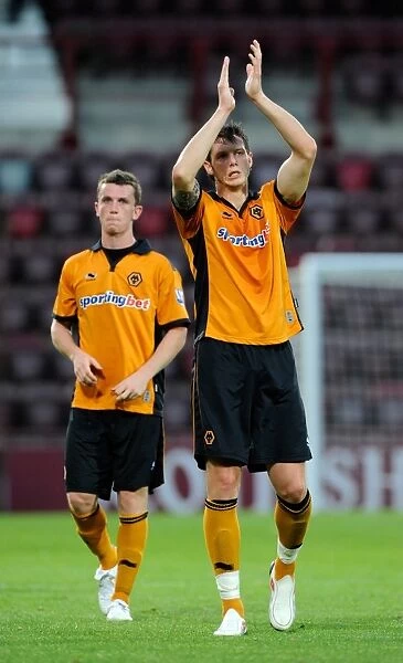 Wolverhampton Wanderers Greg Halford and Kevin Foley Salute Fans in Heart of Midlothian Friendly