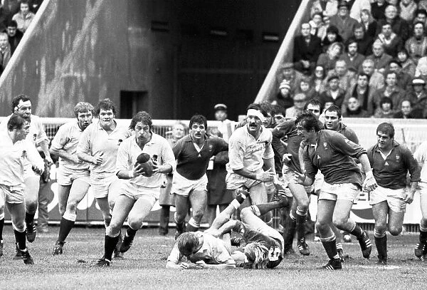 Englands John Scott runs with the ball against France - 1980 Five Nations
