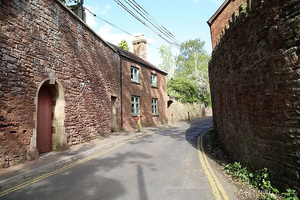 Country lane in English village, Bishops Lydeard, Somerset, UK