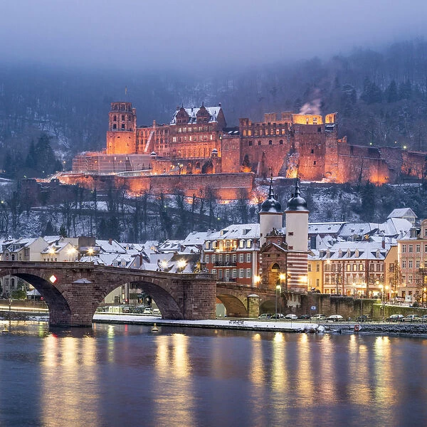 Alte Brucke (Old Bridge) and castle in winter with Neckar river, Heidelberg, Baden-Wurttemberg