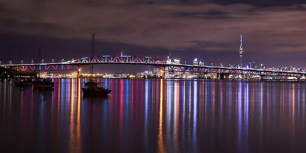 Auckland Harbour Bridge reflections at night, Auckland, New Zealand
