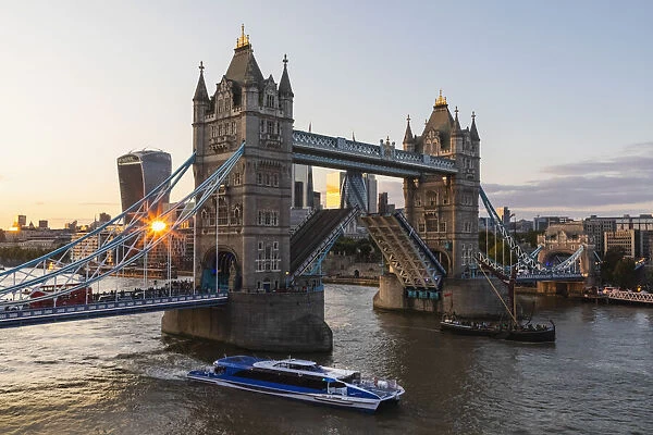 England, London, Tower Bridge, Thames Cruise Boat Passing Through Open Tower Bridge